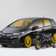 Illustration for article titled A Honda Fit With A Grom In The Back Is Something We Need Yesterday